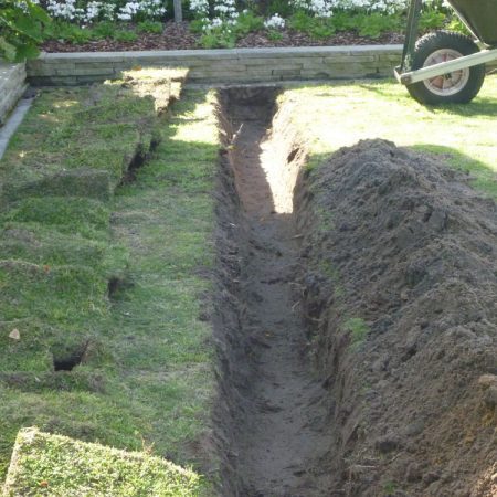 Close up of trench for root barrier